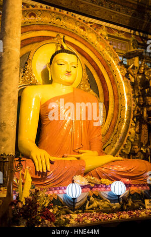 Buddha statue, Gangaramaya temple, Colombo, Sri Lanka Stock Photo