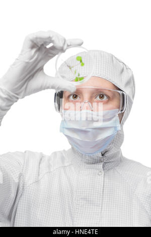 Vertical portrait of biologist while working with plant samples Stock Photo