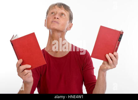 Model release, Frau, 60+, mit Buechern - woman, 60 + , with books Stock Photo