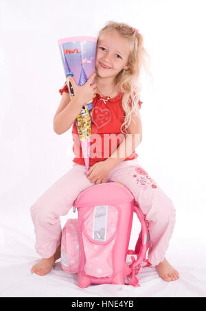 Model release, Schulanfaengerin mit Schultuete - first grader with First-Day-of School-cornet Stock Photo