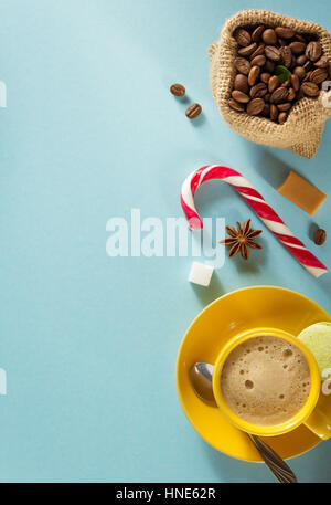 coffee cup and beans at blue background texture Stock Photo