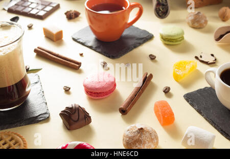 coffee cup and beans at paper background Stock Photo