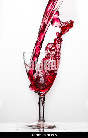 Wine glass with red water Stock Photo