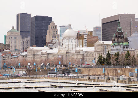 Montreal, CANADA - April 18 2014: View of the Bonsecours market and downtown Montreal from thhe Old Port of Montreal in winter season. Stock Photo