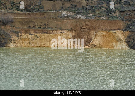 Artificial lake created by sinking old quartz sand mine Stock Photo