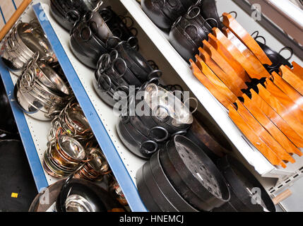 Kitchen utensils on display in store Stock Photo