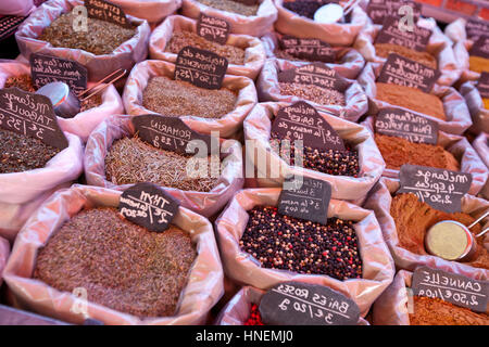 Variety of spices on display in store Stock Photo