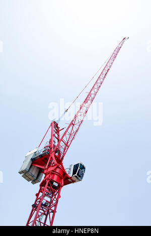 Close-up view of a red crane against sky Stock Photo
