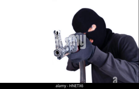 terrorist with ak47 machine gun isolated on white background Stock Photo