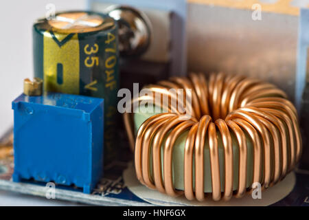 Inductance coil on circuit board Stock Photo