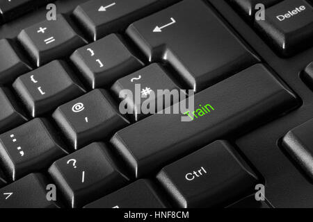Computer Keyboard with Green Train Key Stock Photo
