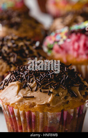 homemade party cupcakes on table with selective focus Stock Photo