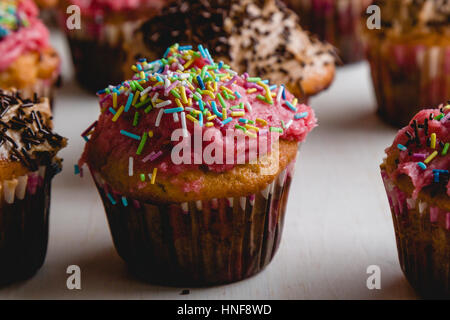 homemade party cupcakes on table with selective focus Stock Photo