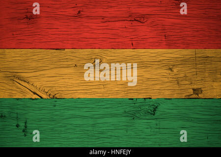 Bolivia civil flag painted on old oak wood. Painting is colorful on planks of old train carriage. Stock Photo