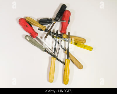 An old colorful screwdriver isolated on a white background Stock Photo