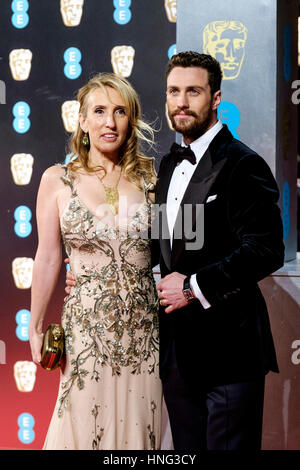 London, UK. 12th February 2017. Sam Taylor-Johnson and Aaron Taylor-Johnson arrives at the EE British Academy Film Awards on 12/02/2017 at Royal Albert Hall, . Persons pictured: Sam Taylor-Johnson, Aaron Taylor-Johnson. Credit: Julie Edwards/Alamy Live News Stock Photo