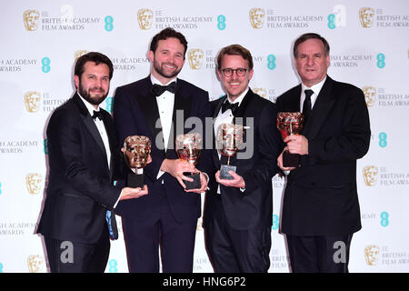 Robert Legato, Dan Lemmon, Andrew R Jones, Adam Valdez with the award for Best Special Visual Effects for the film The Jungle Book in the press room during the EE British Academy Film Awards held at the Royal Albert Hall, Kensington Gore, Kensington, London. Stock Photo