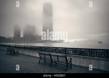 New Jersey and New York City in a foggy day viewed from park Stock Photo