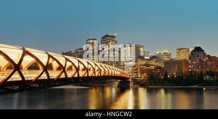 Calgary cityscape with Peace Bridge and downtown skyscrapers in Alberta at night, Canada. Stock Photo