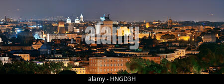 Rome rooftop panorama view with skyline and ancient architecture in Italy at night. Stock Photo