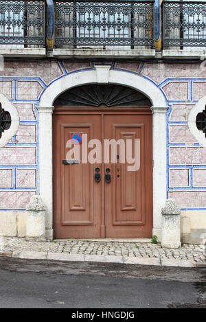 Typical portuguese door with azulejo tiles Stock Photo