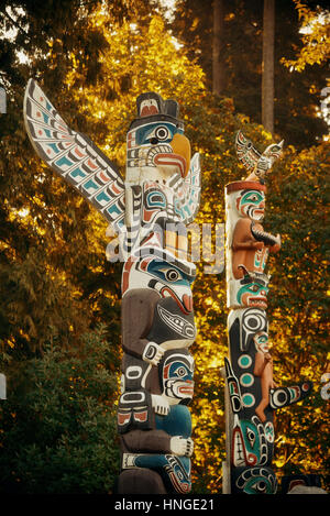 Indian totem poles in Stanley park in Vancouver, Canada. Stock Photo