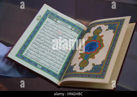 Open pages of the Koran, in the Sultan Qaboos Grand Mosque, in Muscat, in the Sultanate of Oman Stock Photo