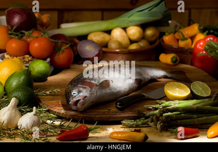 Trout with fruit and vegetable ingredients Stock Photo