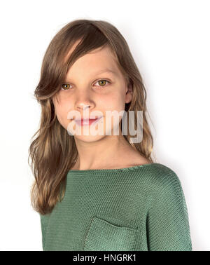 A portrait of a young girl in a green crochet jumper on a white background