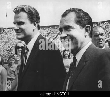 Evangelist Billy Graham with Richard Nixon, September 8, 1968, in Pitt Stadium for Graham's final evangelist crusade service in Pittsburgh, Pennsylvania. Soon to be elected President, Nixon was on a campaign tour as the Republican presidential candidate. Stock Photo