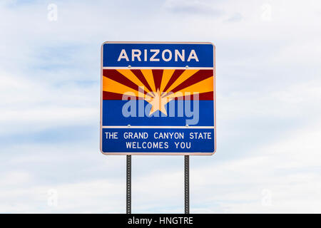 Arizona sign near by the road in entrance state area,Arizona,usa. Stock Photo