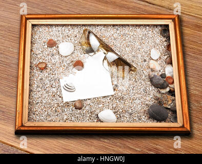 Shells, starfish ,blank paper sheet ,sunglasses and frame Stock Photo