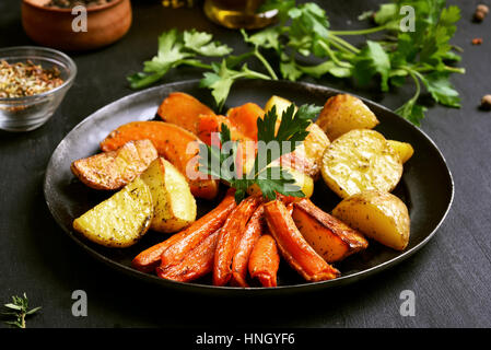 Roasted vegetables in frying pan, close up view Stock Photo