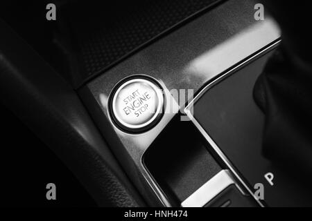 Modern luxury car interior detail, engine start stop button Stock Photo