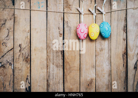 egg easter hanging on wood background with space Stock Photo