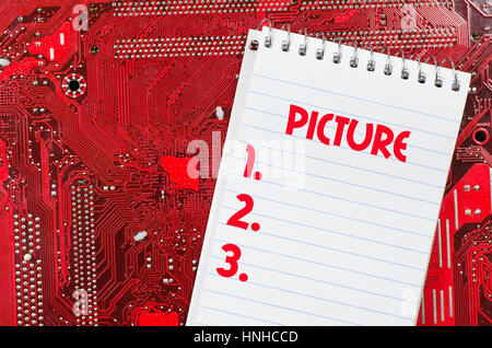 Red old dirty computer circuit board and text concept Stock Photo