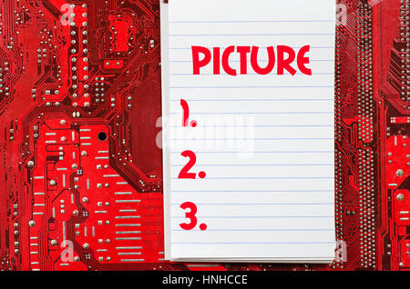 Red old dirty computer circuit board and text concept Stock Photo