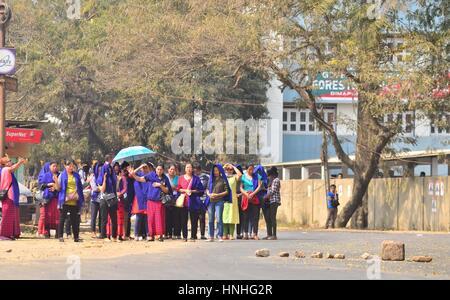 Dimapur, India. 13th Feb, 2017. Naga women protesters pray as they block road during a total bandh across the state by Joint Coordination Committee (JCC) against 33% women reservation in Urban Local Bodies (ULB) election in Dimapur, India north eastern state of Nagaland. Normal life in the Indian north eastern state were effected as the Joint Coordination Committee continue to protests against the government decision for the 33% women reservation in the Urban Local Bodies Election in the state. Credit: Caisii Mao/Alamy Live News Stock Photo