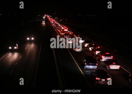 Yuba City, California, USA. 12th Feb, 2017. Vehicles drive out of Yuba City on Highway 99 in bumper to bumper traffic after the Oroville Dam spillway failure prompted emergency evacuations of up to 180,000 people in Yuba City, California. Credit: Joel Angel Juarez/ZUMA Wire/Alamy Live News Stock Photo