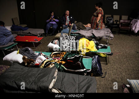 Chico, California, USA. 12th Feb, 2017. People gather at an emergency shelter at the Neighborhood Church after the Oroville Dam spillway failure prompted emergency evacuations of up to 180,000 people in Chico, California. Credit: Joel Angel Juarez/ZUMA Wire/Alamy Live News Stock Photo