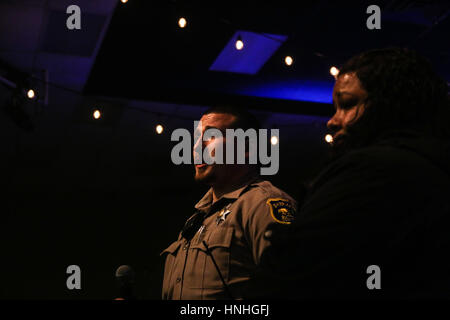 Chico, California, USA. 12th Feb, 2017. Butte County Deputy Sheriff DICKERSON speaks to evacuees at the Neighborhood Church after the Oraville Dam spillway prompted emergency evacuations of up to 180,000 people in Chico, California. Credit: Joel Angel Juarez/ZUMA Wire/Alamy Live News Stock Photo