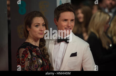 London, UK. 12th Feb, 2017. Eddie Redmayne and Hannah Bagshawe arrive at the EE British Academy Film Awards, Bafta Awards, at the Royal Albert Hall in London, England, Great Britain, on 12 February 2017. Photo: Hubert Boesl - NO WIRE SERVICE - Photo: Hubert Boesl/dpa/Alamy Live News Stock Photo