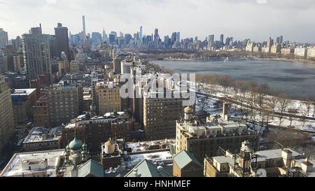 New York City, USA. 13th February, 2017. Central Park under clearing skies after the weekend's stormy weather. New York is looking forward to sunnier weather after a gray weekend. Credit: Ward Pettibone/Alamy Live News Stock Photo