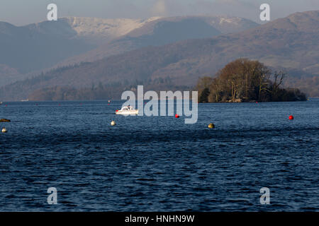 Cumbria, UK. 13th Feb, 2017. UK Weather. Lake Windermere cold sunny clear day with snow on the fells. Credit: Gordon Shoosmith/Alamy Live News Stock Photo