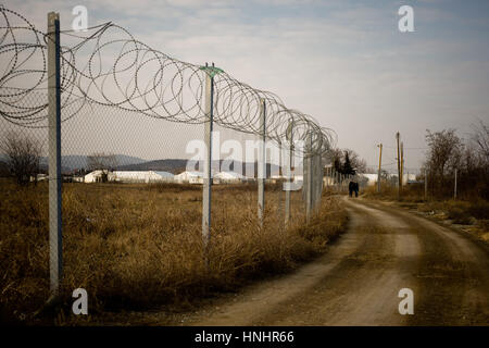 Gevgelija, Macedonia. 13th Feb, 2017. Fence at the Macedonian border with Greece in Gevgelija. As borders remind closed along the refugee route near one hundred migrants of Iraqi, Iranian and Syrian nationalities are staying, most of them since one year ago, at the Temporary Transit Center of Gevgelija. Credit: Jordi Boixareu/Alamy Live News Stock Photo