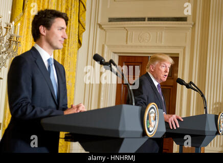 Washington, DC, USA. 13th Feb, 2017. United States President Donald J. Trump, right, and Prime Minister Justin Trudeau of Canada conduct a joint press conference in the White House in Washington, DC on Monday, February 13, 2017. Credit: MediaPunch Inc/Alamy Live News Stock Photo