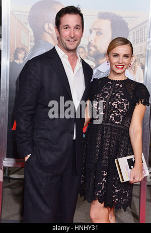 Los Angeles, USA. 13th February 2017. Noah Wyle, wife Sara Wells 044 arriving at the Fist Fight Premiere at the Westwood Village Theatre in Los Angeles. February 13, 2017. Credit: Tsuni / USA/Alamy Live News Stock Photo