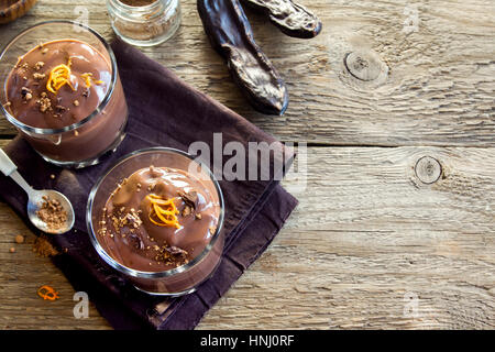 Raw Vegan Chocolate Avocado Banana Pudding with Orange Zest - homemade healthy vegan vegetarian dairy free, gluten free dessert Stock Photo