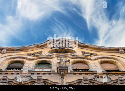 Old building with blue cloudy sky Stock Photo