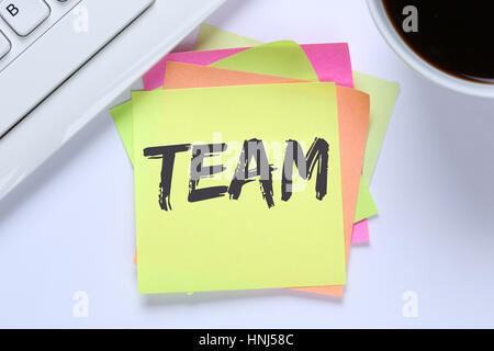 Team teamwork working together office desk computer keyboard Stock Photo